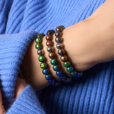 NOGU CHROMATA™ Mood Stone collection beaded bracelets with color-changing green, blue, red and black thermotropic crystals.