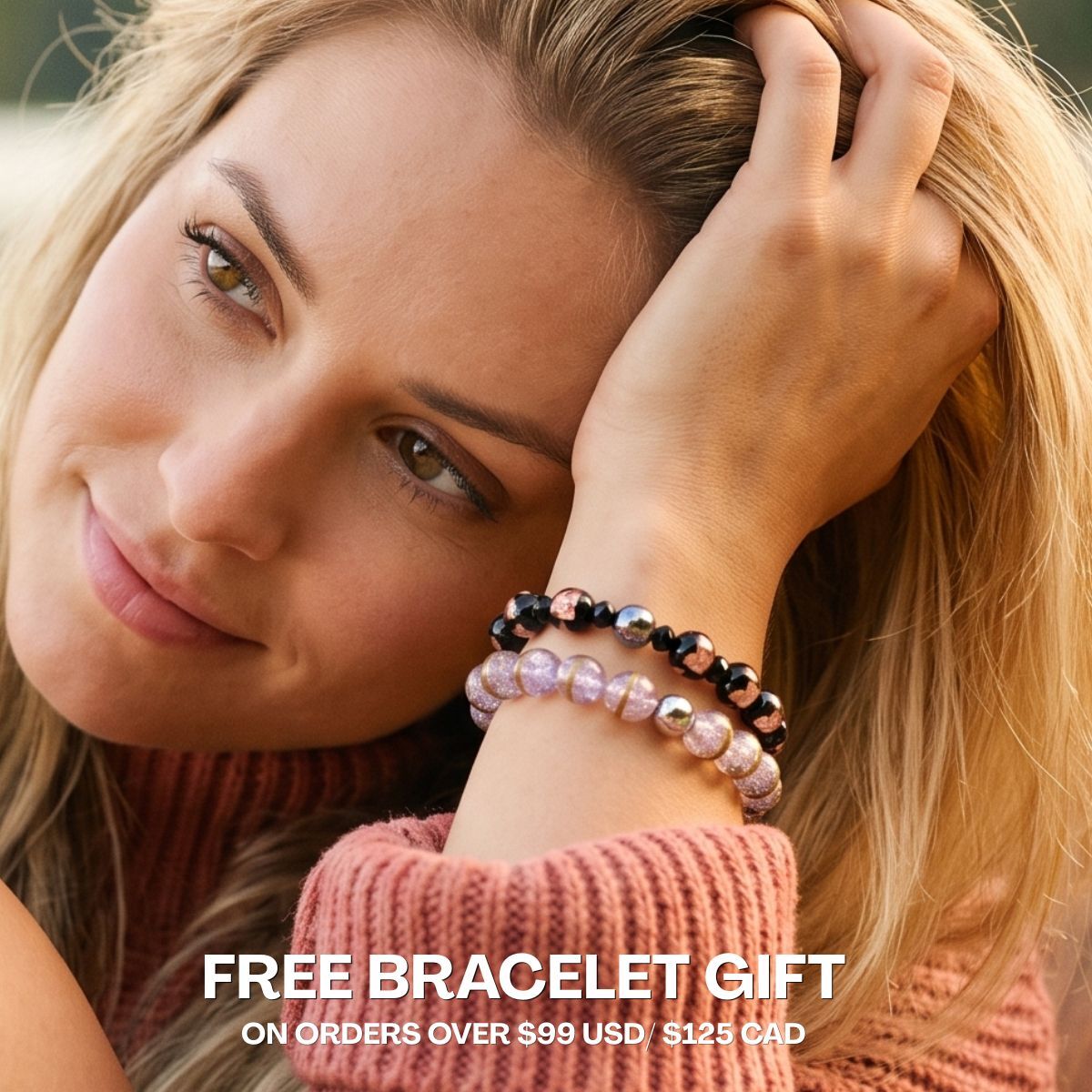 Model wearing stacked black, rose gold and lavender beaded bracelets with metallic accents.