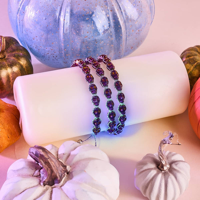 Nyx | Purple Hematite Skulls x Violet GloWeave | Macrame Bracelet