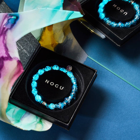 Bracelet boule à neige en verre avec motif de glace aigue-marine | Firefly