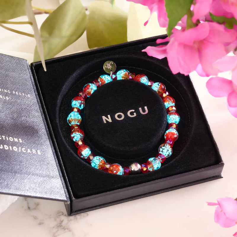 Bracelet boule à neige en verre Firefly | Flamme boréale