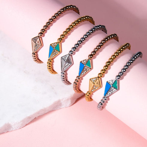 Cerf-volant | Or rose 18 carats | Bracelet à breloques en cristal