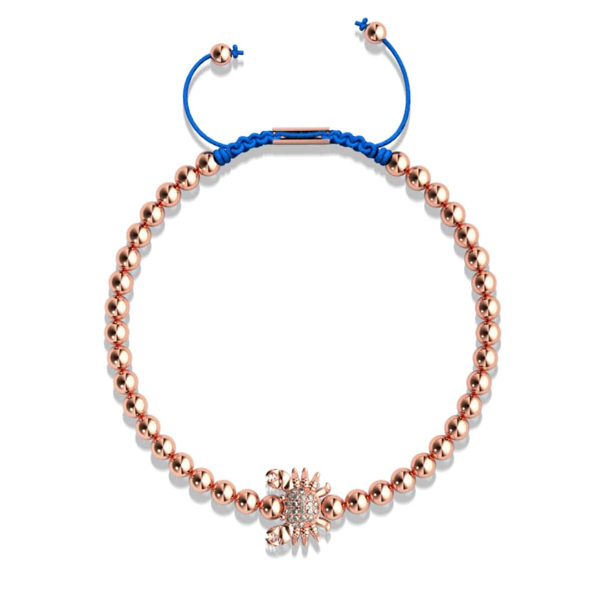 Crabe de mer de cristal | Or rose 18 carats | Bleu | Bracelet Charmballa en macramé