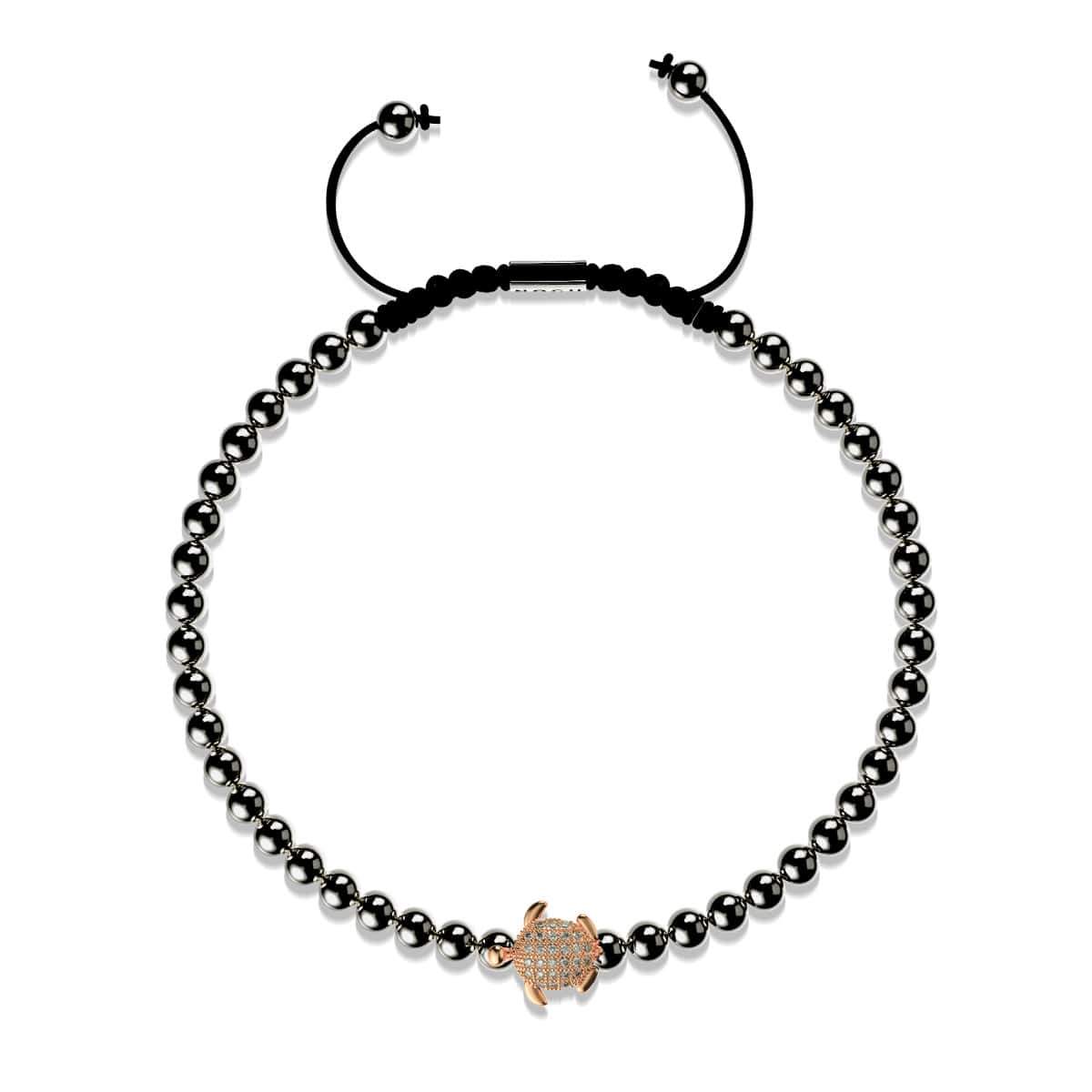 Tortue | Or rose 18 carats et bronze à canon | Noir | Tortue de mer de cristal | Bracelet Charmballa en macramé