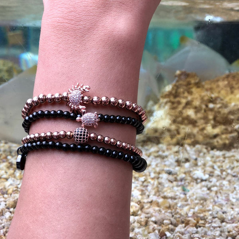 Charismatique | Or rose 18 carats | Cristaux de zircone cubique noire | Bracelet Expression