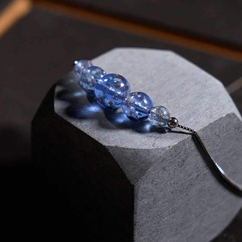 Indigo | Argent sterling .925 | Collier fermoir infini en verre luciole