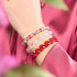 Bracelet mini galet de verre galaxie arc-en-ciel supernova x fil rouge