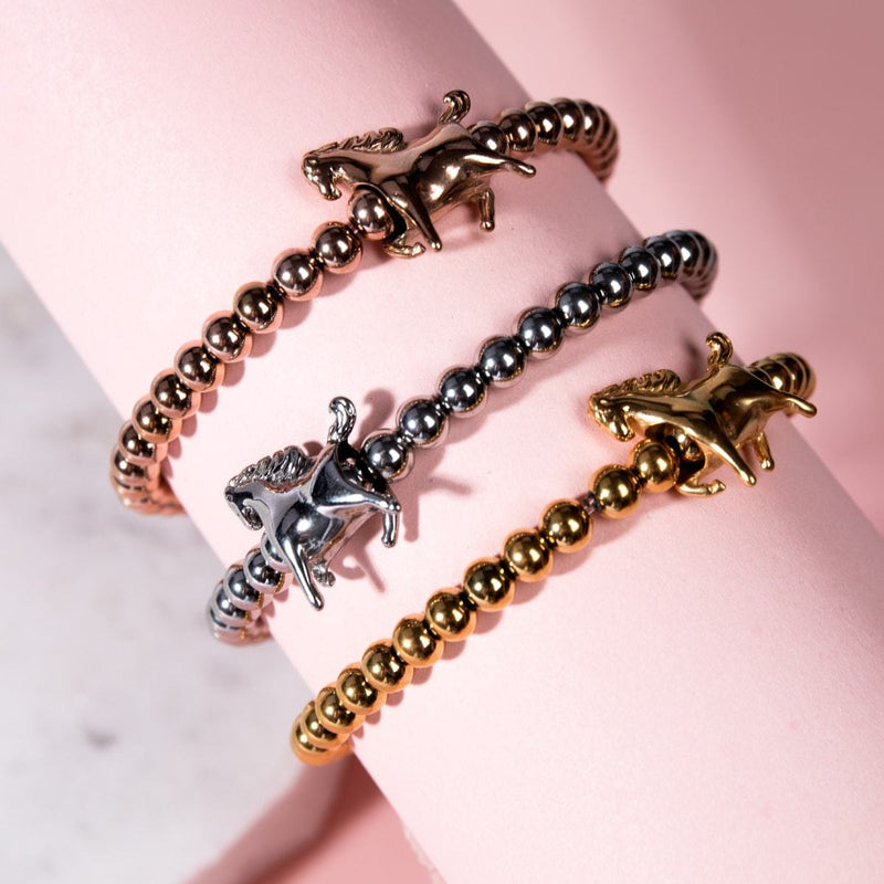 Équitation | Or rose 18 carats | Bracelet à breloques cheval