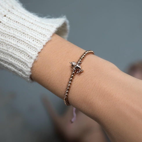 Pégase | Or rose 18 carats | Bracelet à breloques en macramé licorne ailée