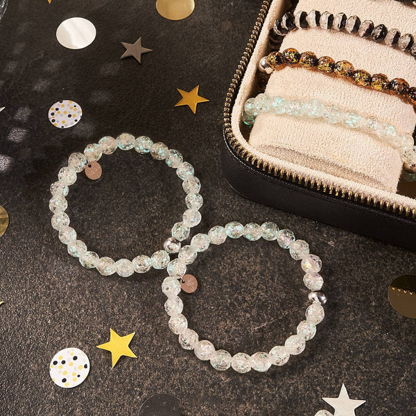 Rainbow Ice Firework Glass Ice Drop bracelet with clear iridescent beads, silver accents, and elastic cord.