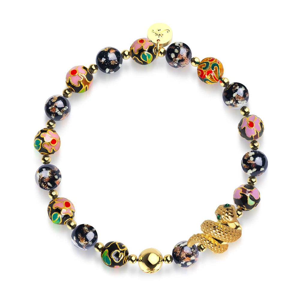 Shadow Dragon bracelet with onyx Firefly glass and enamel lotus beads, gold-plated serpent charm, and stainless steel base by NOGU