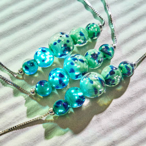 Blue Mint | .925 Sterling Silver | Firefly Glass Infinity Clasp Necklace