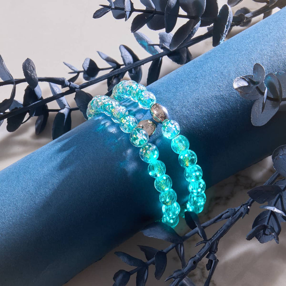 Aurora Spark double wrap bracelet with glowing turquoise and gold Firework Glass beads and .925 sterling silver clasp by NOGU