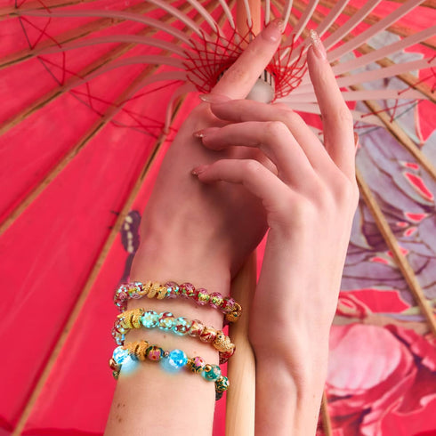 Bracelet serpent doré | Rose en verre avec feu d'artifice