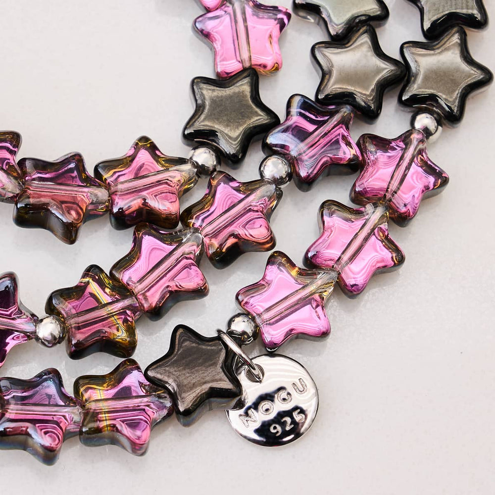Midnight Borealis star wrap necklace with pink and black star beads and NOGU 925 sterling silver charm