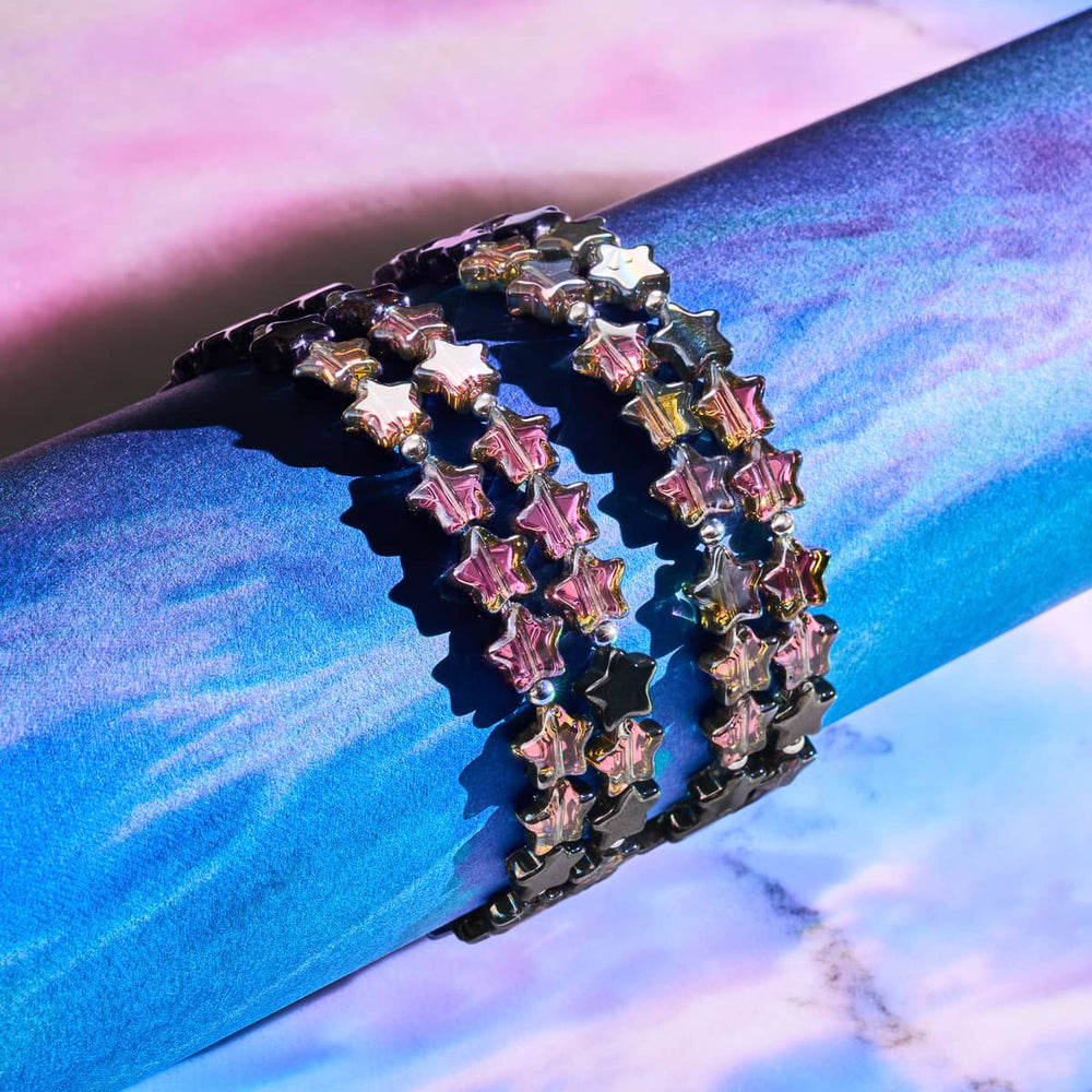 Midnight Borealis star wrap bracelet with pink and black star beads and 18k white gold vermeil on sterling silver base by NOGU