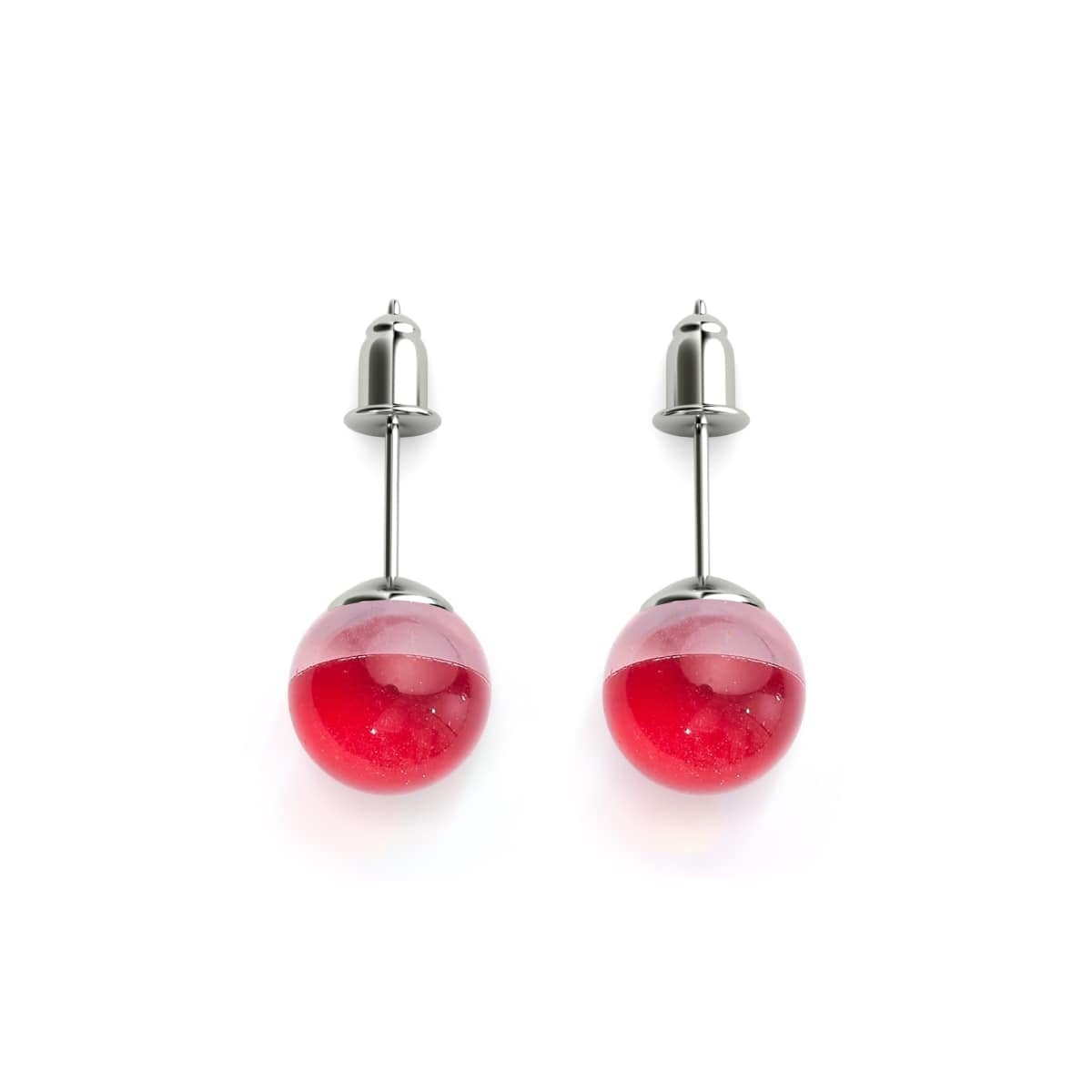 A close-up of the Blood Moon Galaxy Glass Stud Earrings, perfect for a celestial Halloween look.