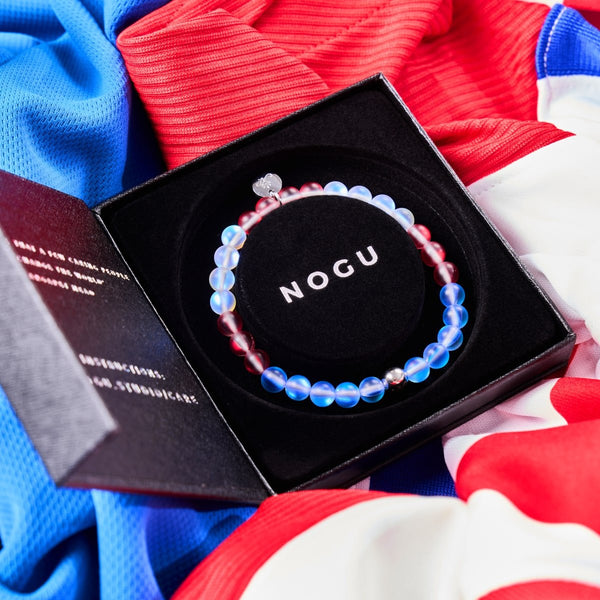 USA III Mermaid Glass Nations Bracelet with 6mm red, blue, and white iridescent beads and silver charm in black NOGU box with red, white, and blue fabric