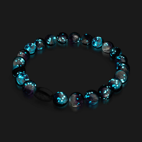 Violet Moon bracelet with glowing 8mm lunar glass beads and sterling silver charm on stretch cord by NOGU
